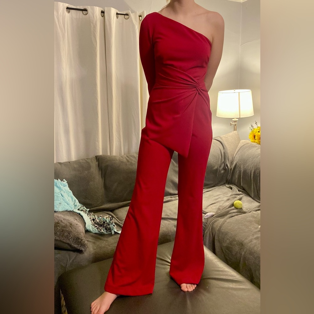 Adrianna Papell one-shoulder red jumpsuit.